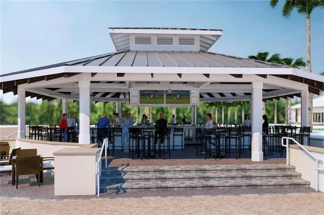 a view of a patio with table and chairs potted plants