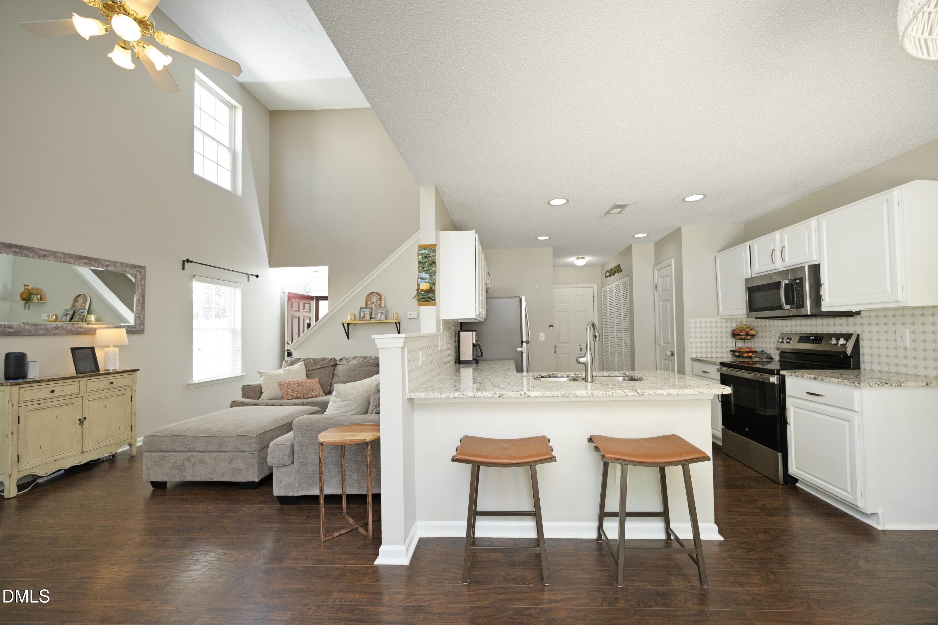 8129 Caliber Woods Drive Raleigh, NC 27616 - Photo 12 of 33 10Living_Kitchen