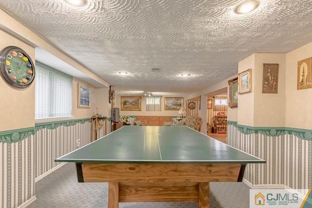 22 Kings Road East Brunswick, NJ 08816 - Photo 19 of 24 a view of a living room and kitchen