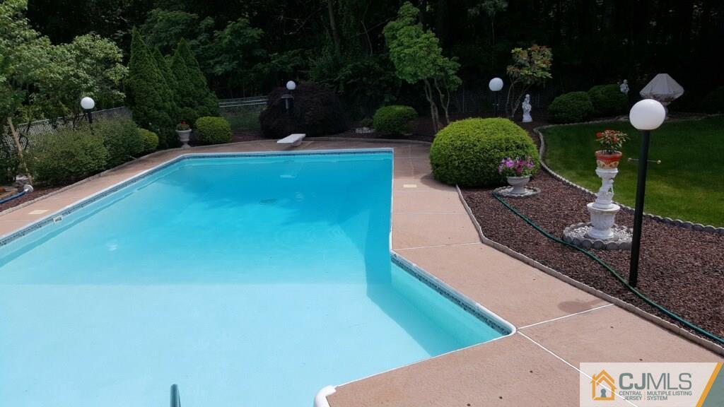 22 Kings Road East Brunswick, NJ 08816 - Photo 23 of 24 a view of a backyard