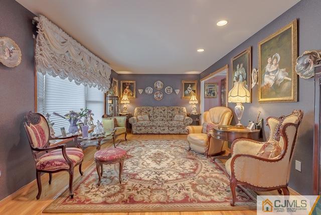 22 Kings Road East Brunswick, NJ 08816 - Photo 4 of 24 a living room with furniture and rug
