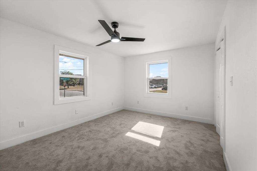 3301 Hedrick Street Fort Worth, TX 76111 - Photo 12 of 22 a view of empty room with windows