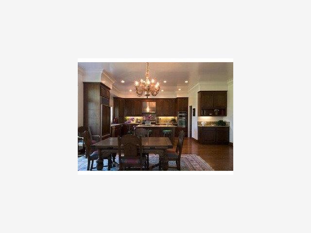 198 Cypress Point Road Half Moon Bay, CA 94019 - Photo 4 of 9 a living room with furniture and a kitchen