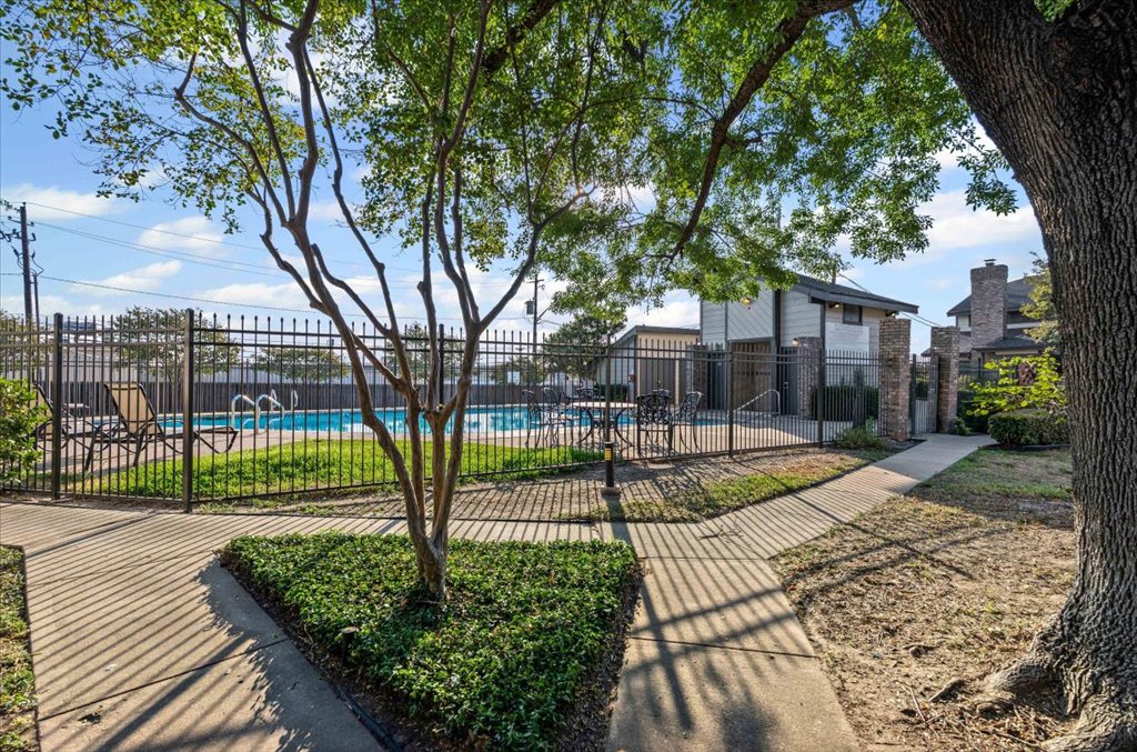 1748 Ohlen Road, Unit 75 Austin, TX 78757 - Photo 26 of 33 View of swimming pool featuring a patio