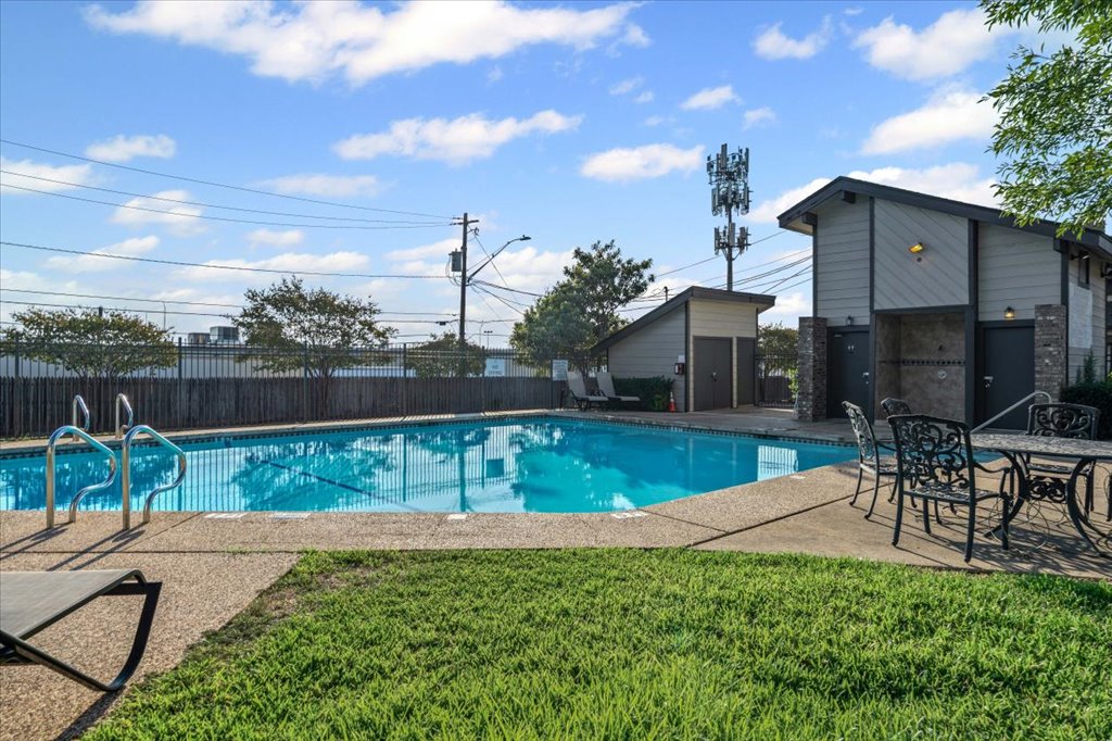 1748 Ohlen Road, Unit 75 Austin, TX 78757 - Photo 27 of 33 View of swimming pool featuring a patio