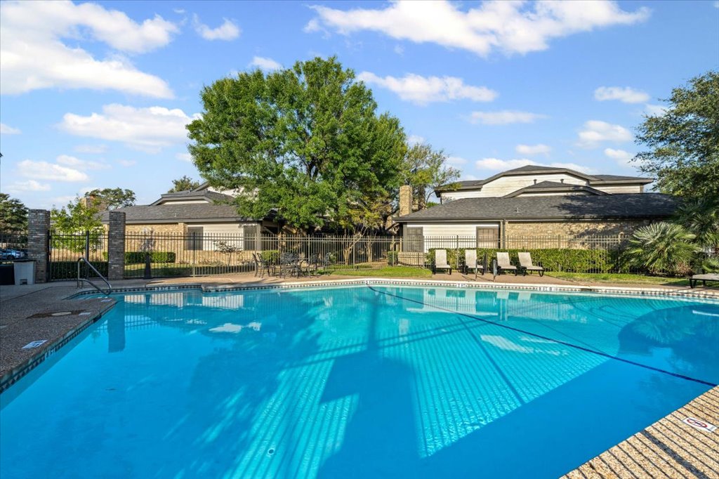 1748 Ohlen Road, Unit 75 Austin, TX 78757 - Photo 28 of 33 Community pool with a patio area