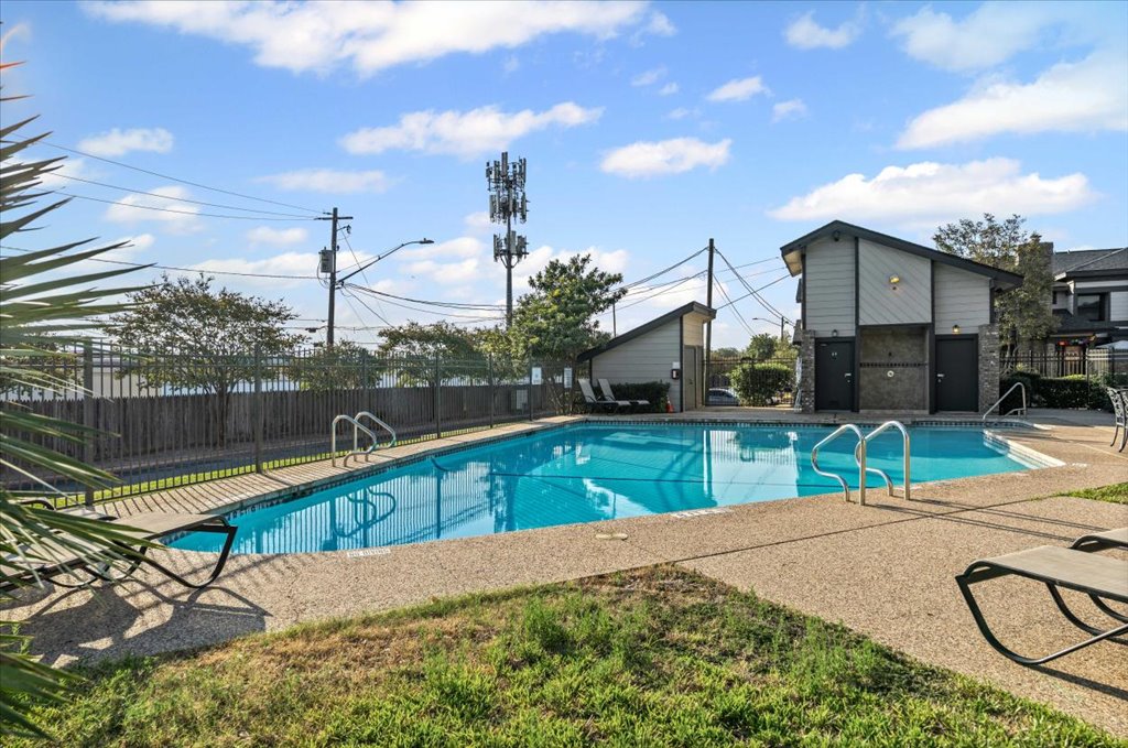 1748 Ohlen Road, Unit 75 Austin, TX 78757 - Photo 30 of 33 View of pool with a patio