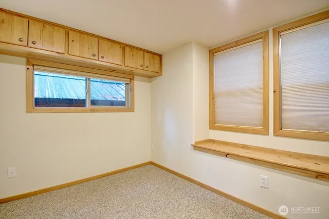 a bathroom with a sink and a window