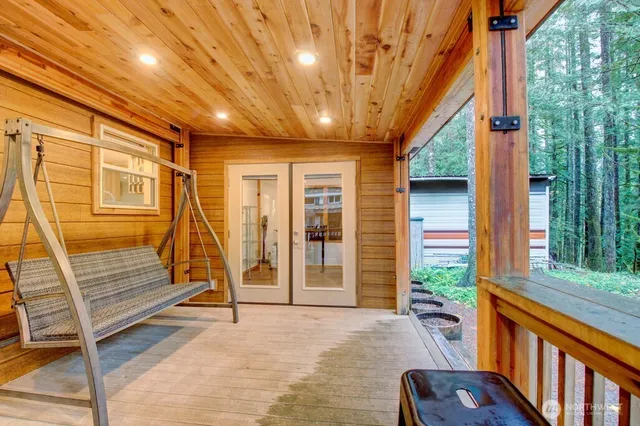 a view of an entryway with a backyard
