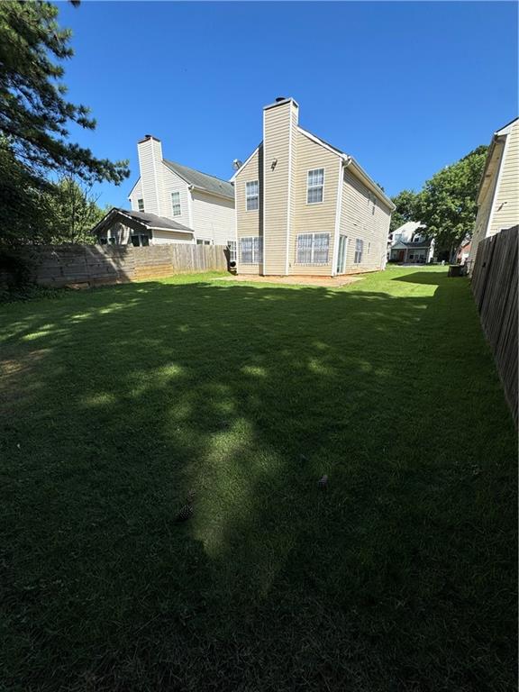 3468 Lehigh Way Decatur, GA 30034 - Photo 16 of 16 a view of a house with a yard and sitting area