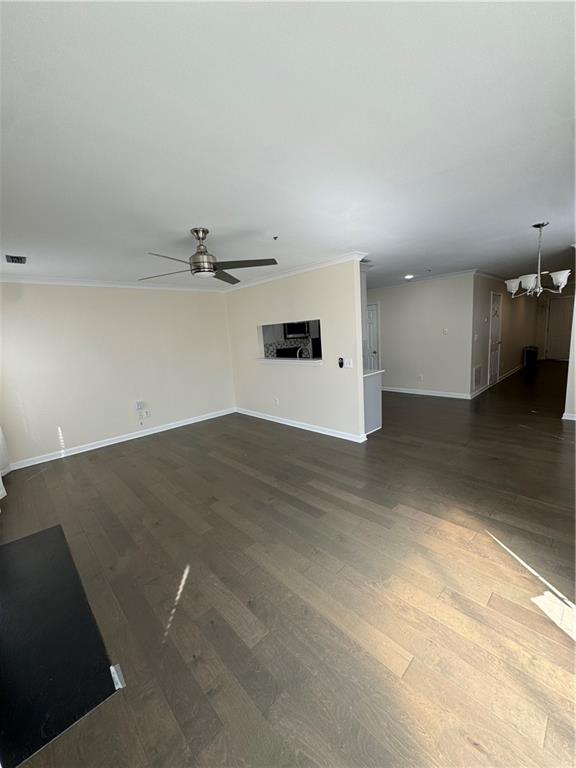 3468 Lehigh Way Decatur, GA 30034 - Photo 6 of 16 an empty room with wooden floor and windows