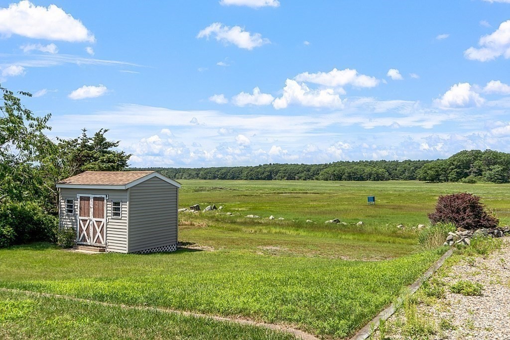 1585 Ocean Boulevard Rye, NH 03870 - Photo 5 of 41 a view of a house with a yard