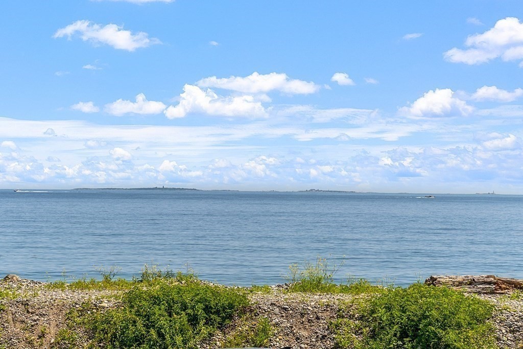 1585 Ocean Boulevard Rye, NH 03870 - Photo 8 of 41 a view of a lake from a yard