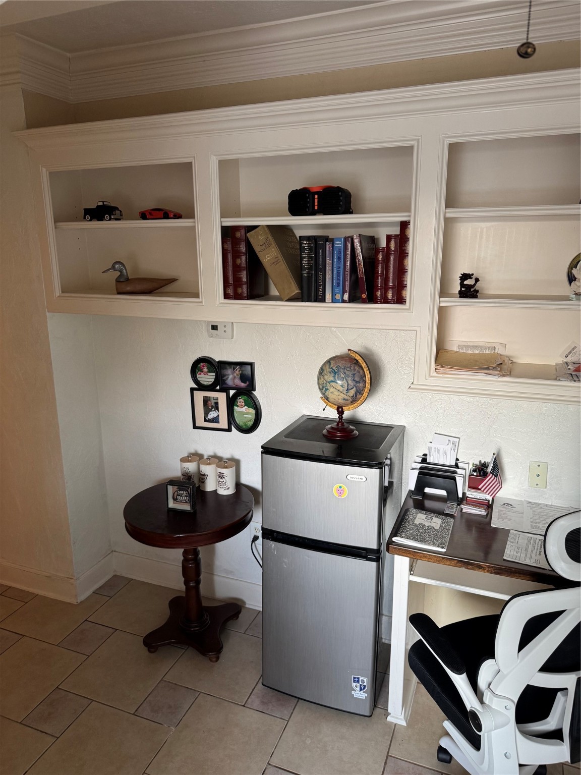 Undisclosed Address Arcola, TX 77583 - Photo 12 of 19 a room with a washing machine and a chair