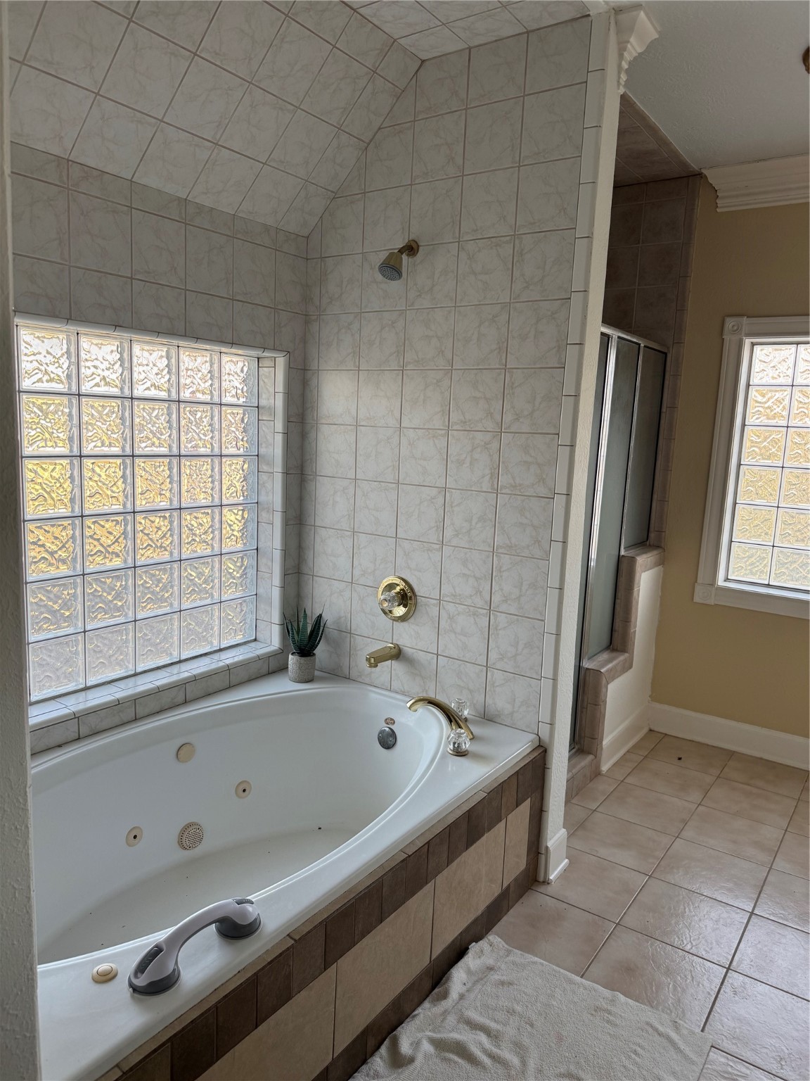 Undisclosed Address Arcola, TX 77583 - Photo 15 of 19 a bathroom with a bathtub and shower