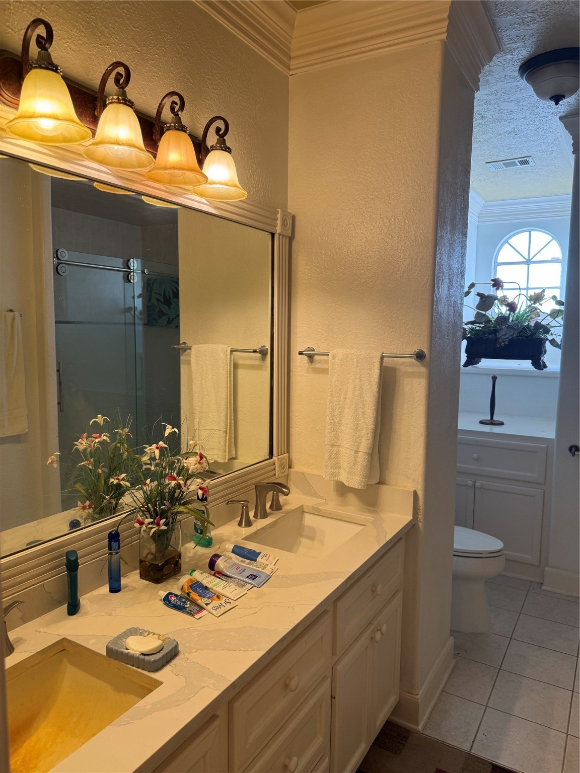 Undisclosed Address Arcola, TX 77583 - Photo 17 of 19 a bathroom with a sink double vanity and a mirror