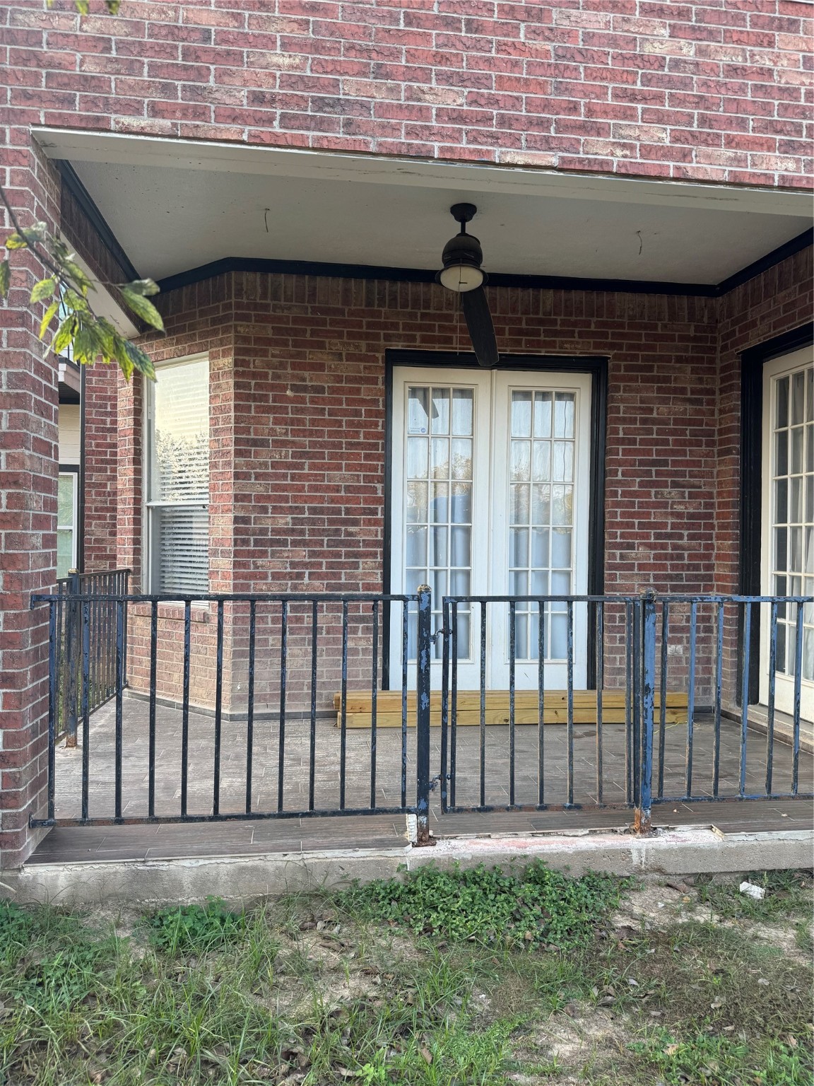 Undisclosed Address Arcola, TX 77583 - Photo 2 of 19 a front view of a house with a garden