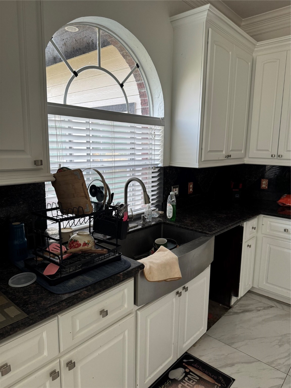 Undisclosed Address Arcola, TX 77583 - Photo 8 of 19 a kitchen with stainless steel appliances granite countertop a stove a sink and a microwave