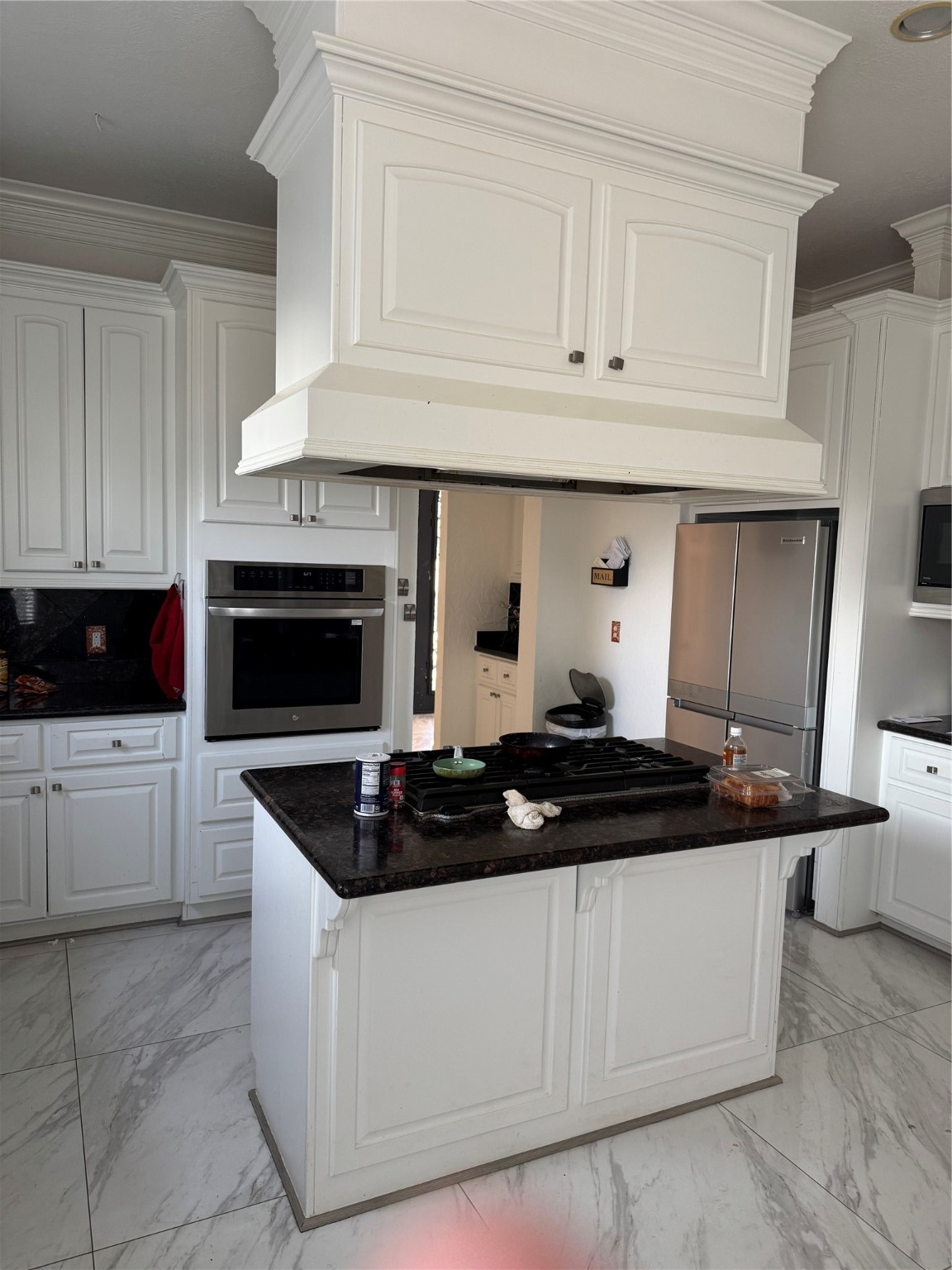 Undisclosed Address Arcola, TX 77583 - Photo 9 of 19 a kitchen with stainless steel appliances granite countertop white cabinets and stove