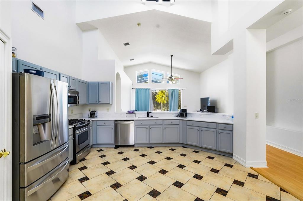 2807 Manning Drive Trinity, FL 34655 - Photo 12 of 48 a kitchen with a sink stove and refrigerator