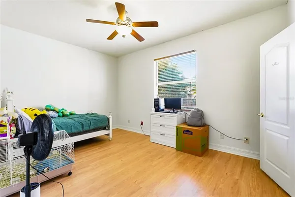a bed room with furniture and a window