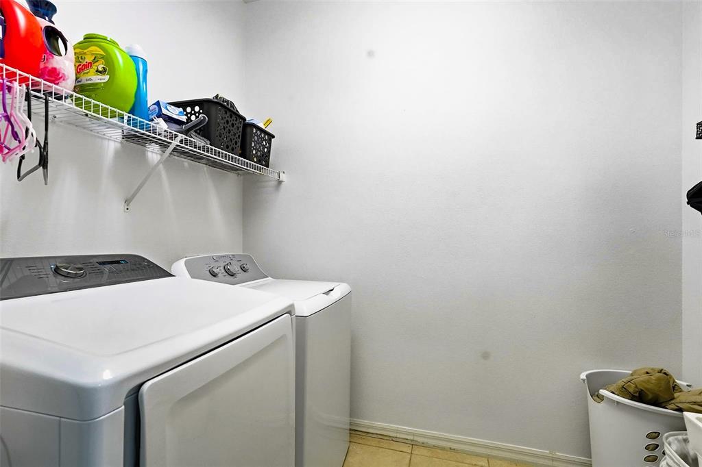 2807 Manning Drive Trinity, FL 34655 - Photo 34 of 48 a utility room with dryer and washer