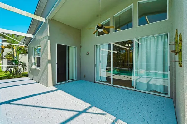 a view of a house with swimming pool