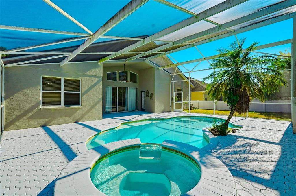 2807 Manning Drive Trinity, FL 34655 - Photo 36 of 48 a view of a house with swimming pool