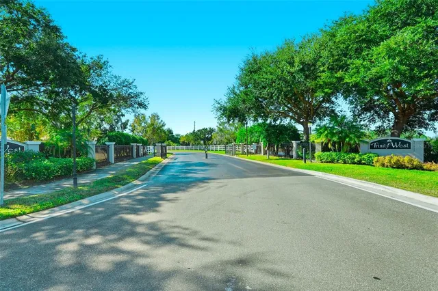 an aerial view of a house with a swimming pool