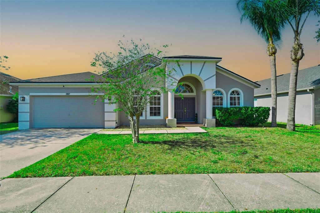 2807 Manning Drive Trinity, FL 34655 - Photo 4 of 48 a house view with a garden space