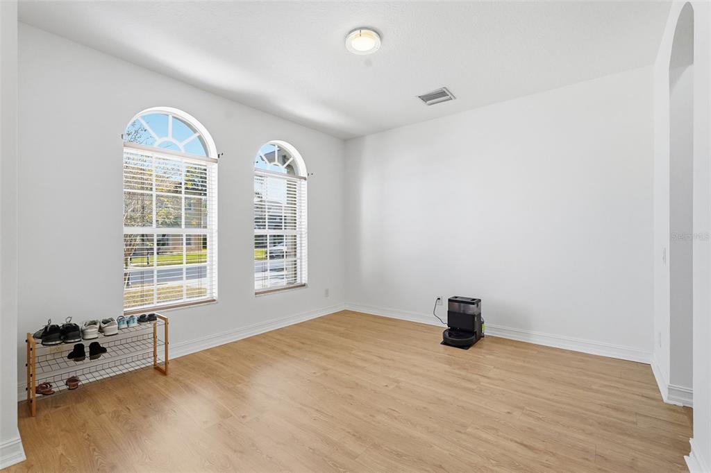 2807 Manning Drive Trinity, FL 34655 - Photo 10 of 48 a bedroom with a bed and a large window