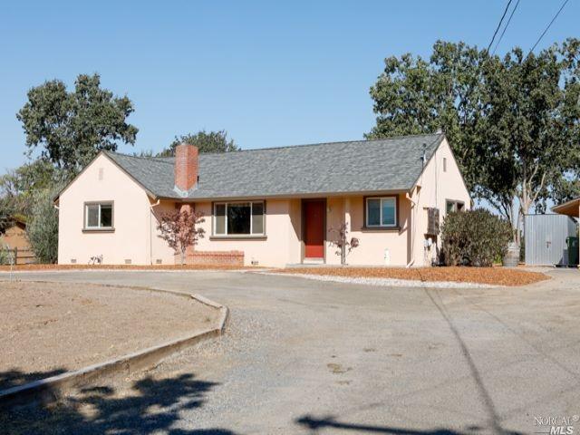 560 Irwin Lane Santa Rosa, CA 95401 - Photo 1 of 1 a front view of a house with a yard