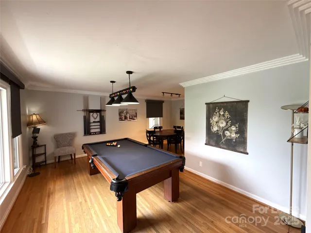 a living room with a table and a couch