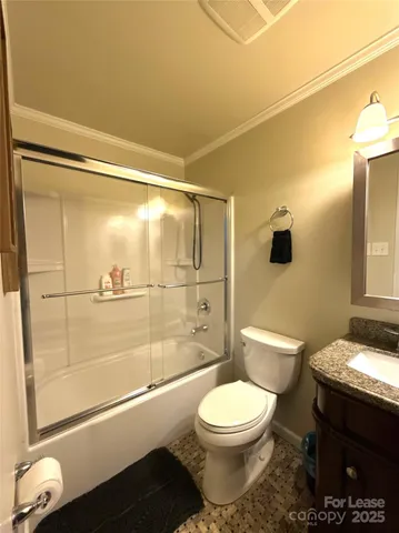 a room with furniture and wooden floor