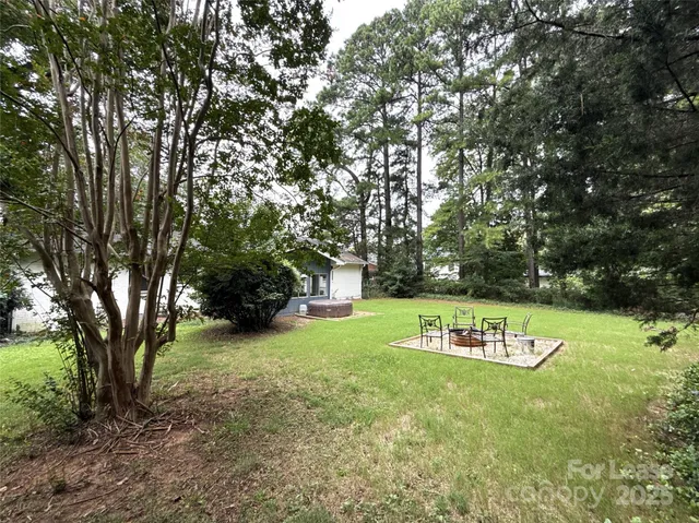 a picture of a rug and a book in a kitchen
