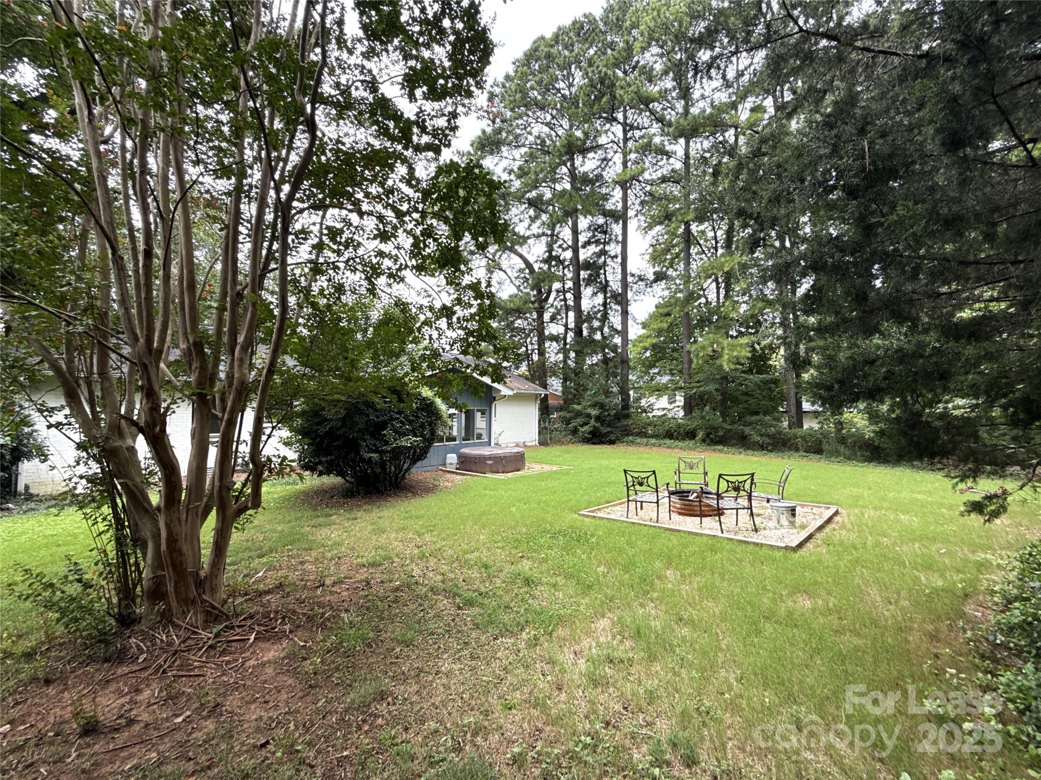 1600 Paddock Circle Charlotte, NC 28209 - Photo 33 of 34 a view of backyard with huge green area and large trees