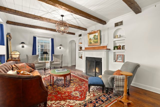 3022 Thayer Street Evanston, IL 60201 - Photo 5 of 23 a living room with furniture and a fireplace