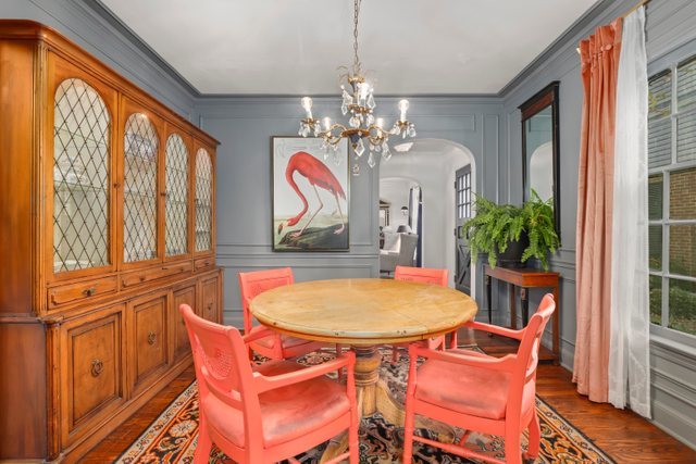 3022 Thayer Street Evanston, IL 60201 - Photo 8 of 23 a view of a dining room with furniture and a chandelier