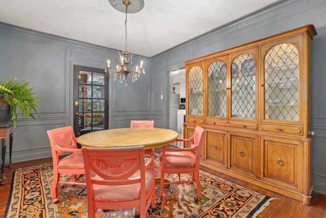 3022 Thayer Street Evanston, IL 60201 - Photo 9 of 23 a dining room with a table and chairs