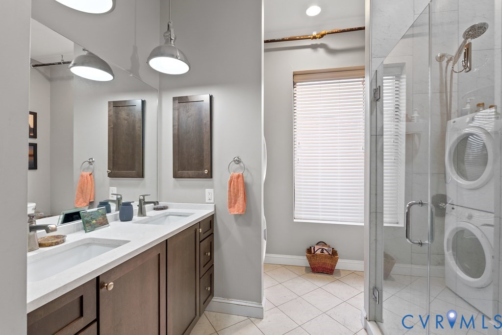 215 West 3rd Street Farmville, VA 23901 - Photo 18 of 52 a bathroom with a sink double vanity and a mirror