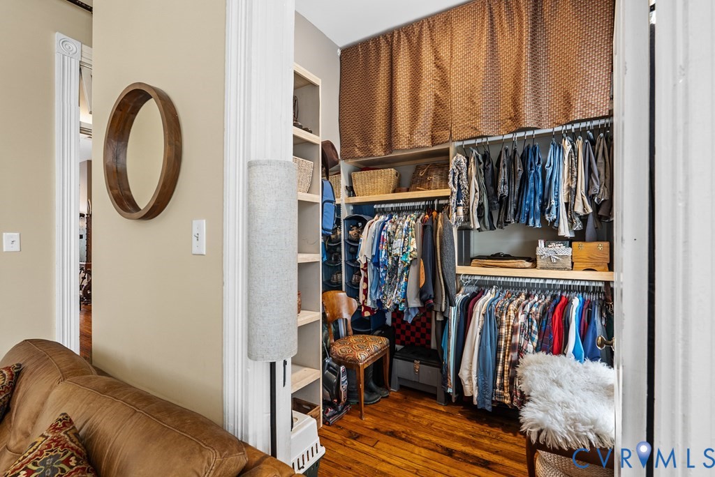 215 West 3rd Street Farmville, VA 23901 - Photo 36 of 52 a view of walk in closet with clothes and shoes