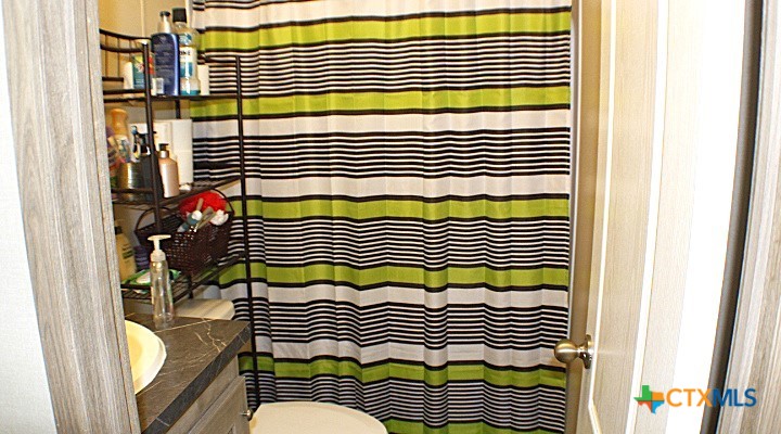 12240 Fm 1383 Schulenburg, TX 78956 - Photo 14 of 24 a view of a wooden & door