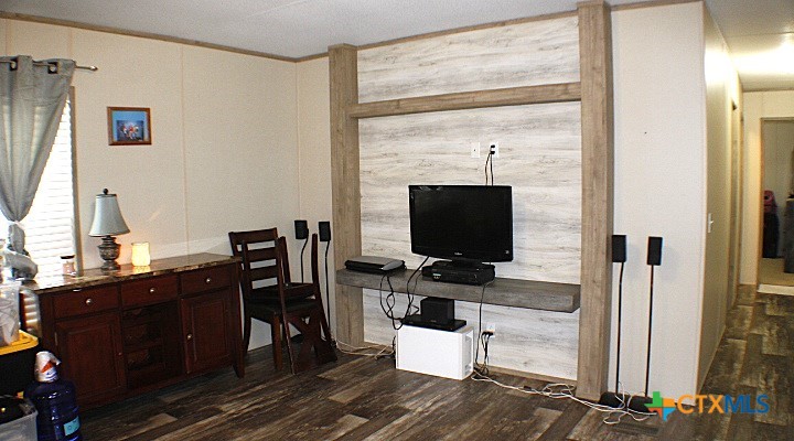 12240 Fm 1383 Schulenburg, TX 78956 - Photo 20 of 24 a view of a workspace with furniture and a flat screen tv
