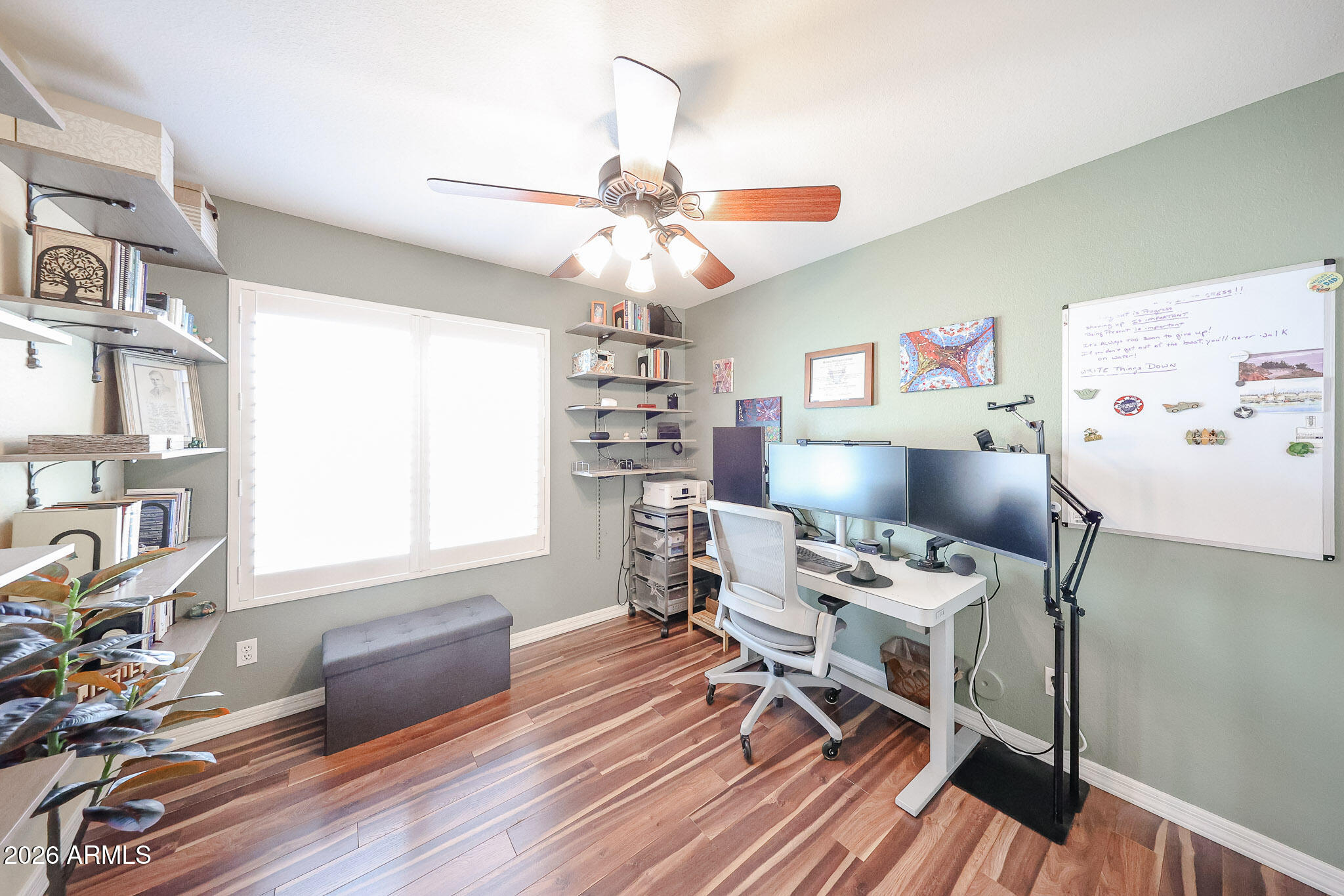6939 West Phelps Road Peoria, AZ 85382 - Photo 18 of 29 a workspace with wooden floor