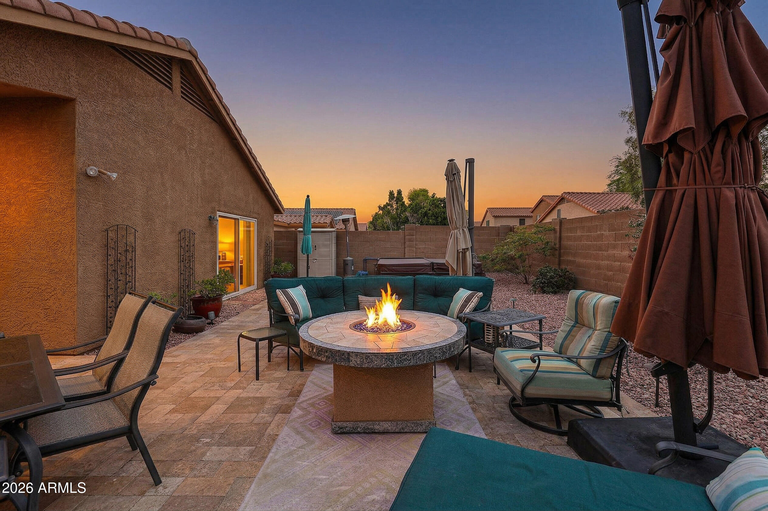 6939 West Phelps Road Peoria, AZ 85382 - Photo 29 of 29 a outdoor space with patio furniture and a potted plant