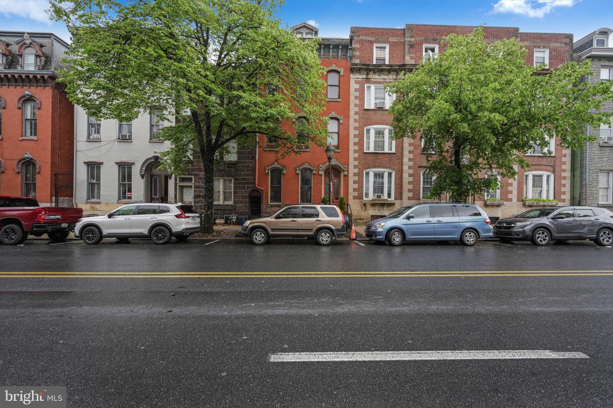 226 South 5th Street Reading, PA 19602 - Photo 3 of 47 a city street lined with buildings and cars