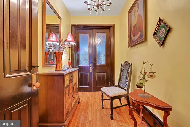 a view of staircase with furniture and rug