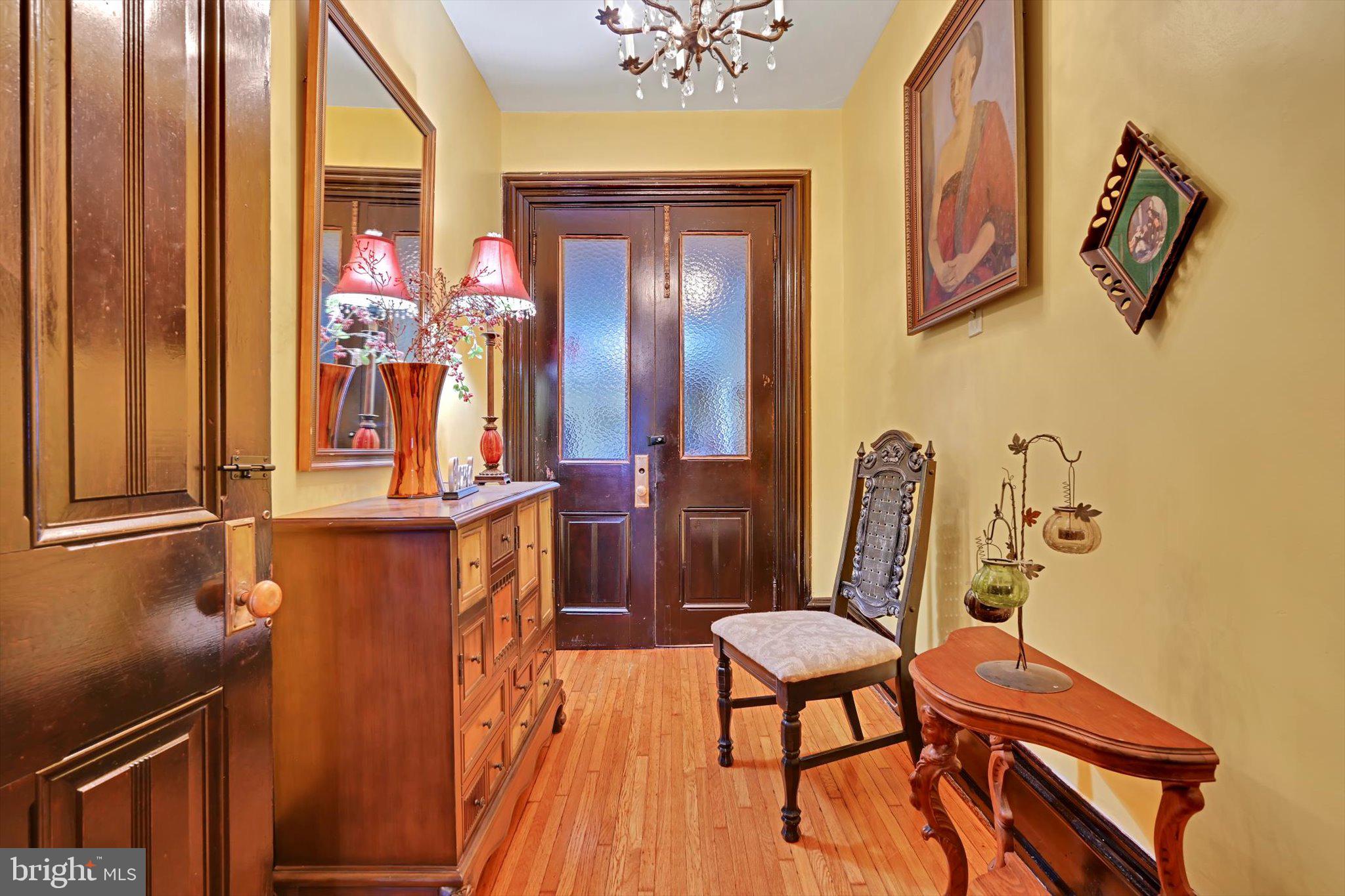 226 South 5th Street Reading, PA 19602 - Photo 8 of 47 a view of a hallway with chairs