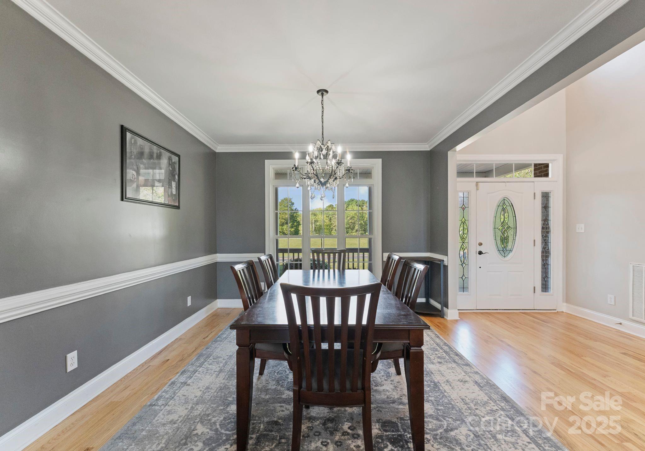 895 East Monbo Road Statesville, NC 28677 - Photo 12 of 44 a view of a dining room with furniture window and outside view