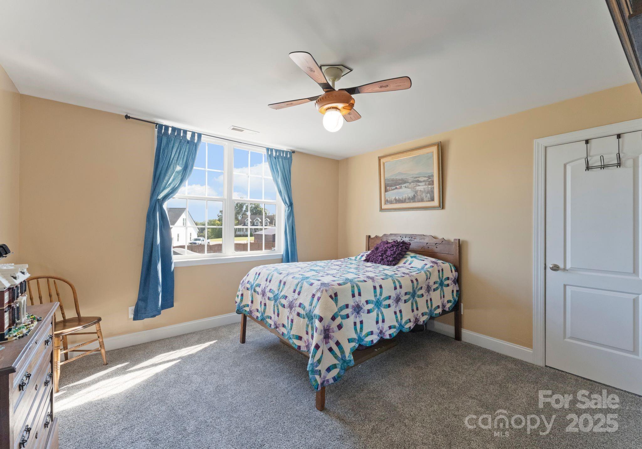 895 East Monbo Road Statesville, NC 28677 - Photo 28 of 44 a bed room with a bed and a window